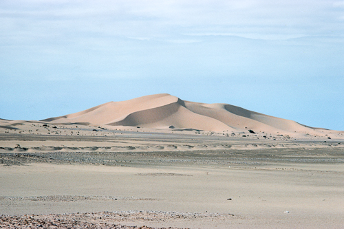 Sand dune with cloud cover