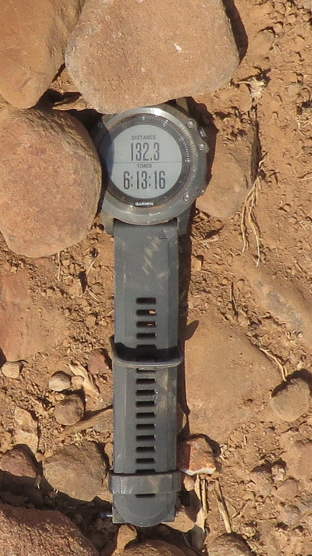 The watch showing distance and time with time still increasing